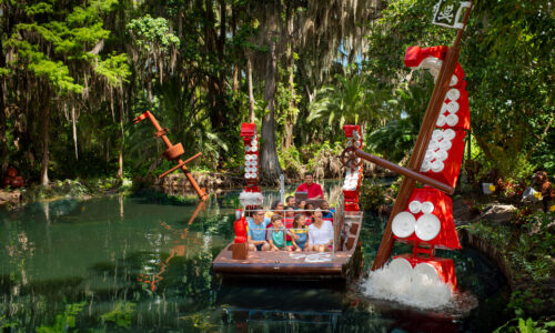 Family riding on Pirate River Quest ride at LEGOLAND Florida